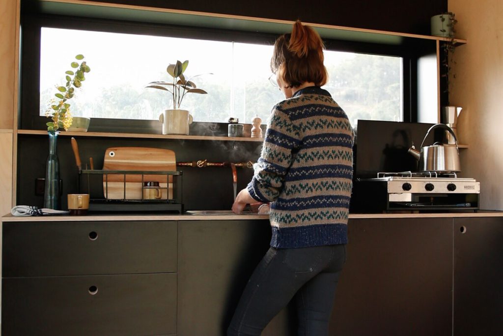 Lady at kitchen sink